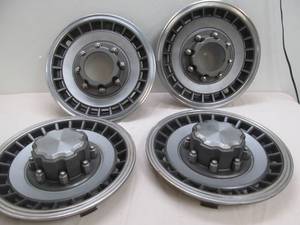 lot 89 image: older hubcaps