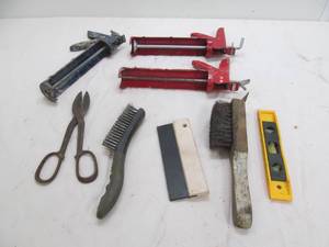 lot 111 image: caulking guns, wire brushes, level, etc.