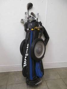 lot 116 image: Wilson golf bag, fire hawk clubs, towel