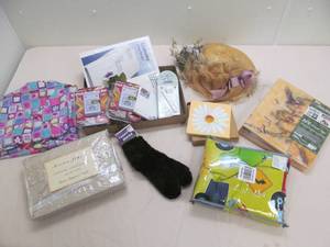 lot 224 image: twin sheet set, photo album, pest repellents, straw hat