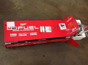 lot 3 image: MILWAUKEE M18 FUEL 18-Volt Lithium-Ion Brushless Cordless String Trimmer with QUIK-LOK Attachment Capability and 8.0 Ah Battery (NOT USED)