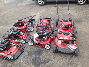 lot 11 image: PALLET WITH 7 LAWNMOWERS SEE PICS FOR PARTS O REPAIR