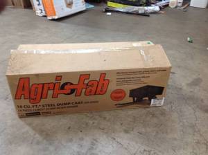 lot 17 image: AGRI-FAB 10 cu. ft. Steel Dump Cart (NOT USED)