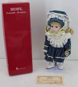 lot 6 image: Brinns Collectible Porcelain Doll. Music Edition