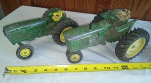 lot 54 image: 2 John Deere Cast tractors  toy