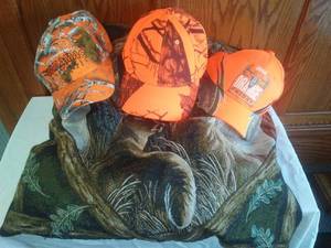 lot 57 image: 3 New orange hunting caps & deer pillow.