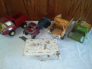 lot 58 image: Tonka & Structo parts Vehicles.