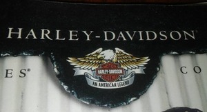 lot 61 image: Harley Davidson, MN Motorcycle licenses & poster.
