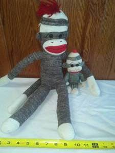 lot 69 image: Pair of Sock Monkeys.