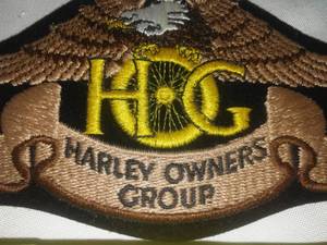 lot 154 image: Harley Davidson Patch and metal plate.