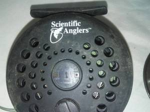 lot 162 image: 2 fly fishing reels and line.