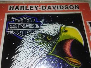 lot 182 image: 2- 6 in. Glass Harley Davidson pieces.