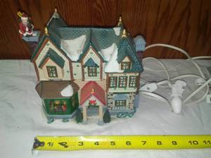 lot 189 image: English Tudor House Christmas Village.