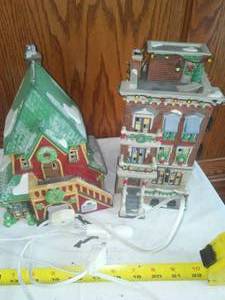 lot 104 image: Dept 56 North Pole, Christmas Village.