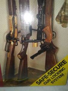 lot 115 image: Gunbar Gun Locking system. New.