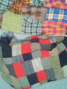 lot 254 image: 2 Handmade vintage quilts  colorful. One is 7x5, the other is 4x6  nice. Both very heavy.