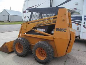 lot 1 image: skid loader