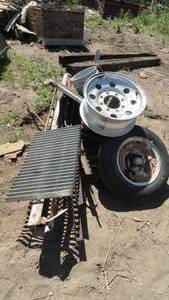 lot 238 image: Rebar, Radiator, Grate, Angle Iron, wheel & rim
