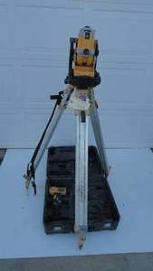 lot 303 image: DeWalt laser cordless rotary DW073 with stand and box