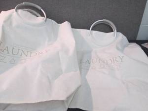 lot 75 image: 2 Large Laundry Totes Z3...