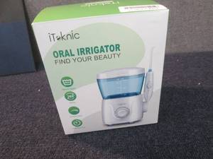 lot 309 image: iToknic Oral Irrigator open box ...