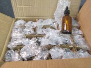 lot 343 image: Box of 24 - 2 oz Amber Bottles with...