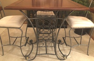 Pub Height Table with Wine Rack and Four StoolsChairs