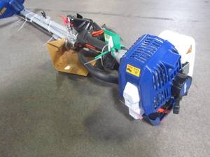 lot 12 image: Badger 26 cc 2-Cycle Gas String Trimmer Full Crank 4- in- 1 Multi-Function with Pole Saw Attachment WBPMT26P