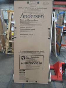 lot 605 image: Custom Ordered 34 x 80 Storm Door by Andersen in Almond, Left Handed.