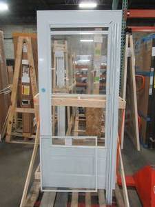 lot 607 image: Andersen Custom Order Storm Door In White 36 x 80. - Some Minor scratches