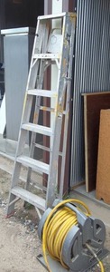 Ladder and Coil of Hose