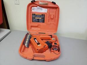 lot 128 image: Paslode Cordless 30-Degree Framing Nailer with Case, Battery, Charger, Fasteners