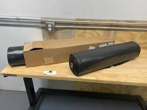 lot 5 image: Lot of 2 Rolls Black Plastic Wrap