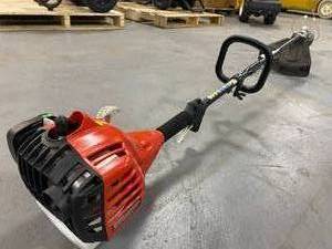 lot 42 image: HOMELITE 2-Cycle 26 CC Straight Shaft Gas Trimmer