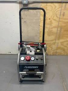 lot 73 image: HUSKY 4.5 Gal. Portable Electric-Powered Silent Air Compressor