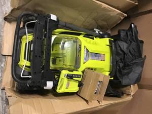 lot 18 image: PALLET WITH RYOBI ELECTRIC LAWN MOWERS SEE PICS