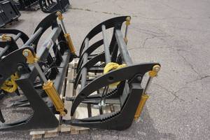 lot 21 image: Brand Universal Mount Bobcat Skid Loader Skid Steer 48 Root Rake BucketAttachment