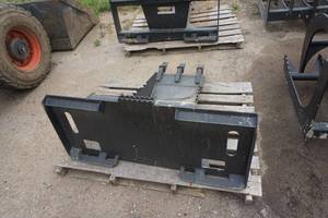 lot 19 image: Brand New Universal Mount Bobcat Skid Loader Skid Steer Stump Bucket