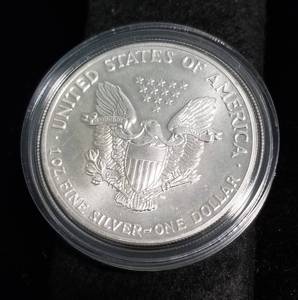 1989 AMERICAN SILVER EAGLE 1 TROY OZ. .999 FINE SILVER IN AIRTITE