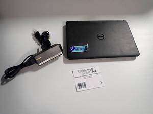 lot 3 image: Dell Lattitude E7250 notebook. Model E7250. Charger included. Slight plastic damage to bottom left corner.