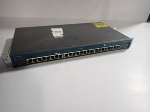 lot 49 image: Network switch. SwitchWS-2950SX-24. E-E011-02-3018(A)