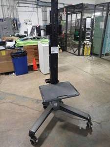lot 54 image: Television stand w wheels