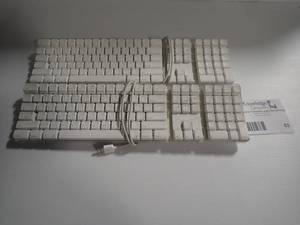 lot 63 image: Apple keyboard bundle
