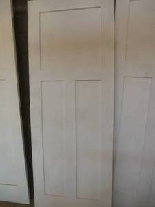 lot 32 image: Bayer Built White Primed Molded Doors