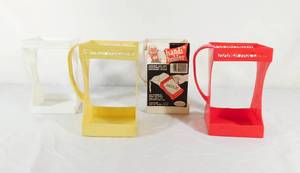 lot 135 image: Set of 4 Vintage 1970s Handi Holder for Milk Cartons