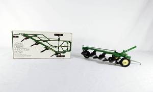 lot 48 image: Vintage John Deere Die Cast 4 Bottom Plow