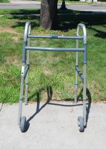 lot 244 image: Adjustable Invacare Walker Model 6281A