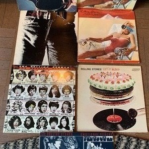 lot 140 image: Lot of Rolling Stone Record Albums and 1980 Promotional Poster