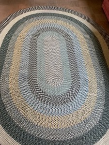 lot 128 image: Large Oval Braided Rug