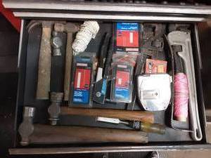 lot 63 image: Contents Of Tool Box Drawer Pipe Wrenches, Hammers, Staples, More